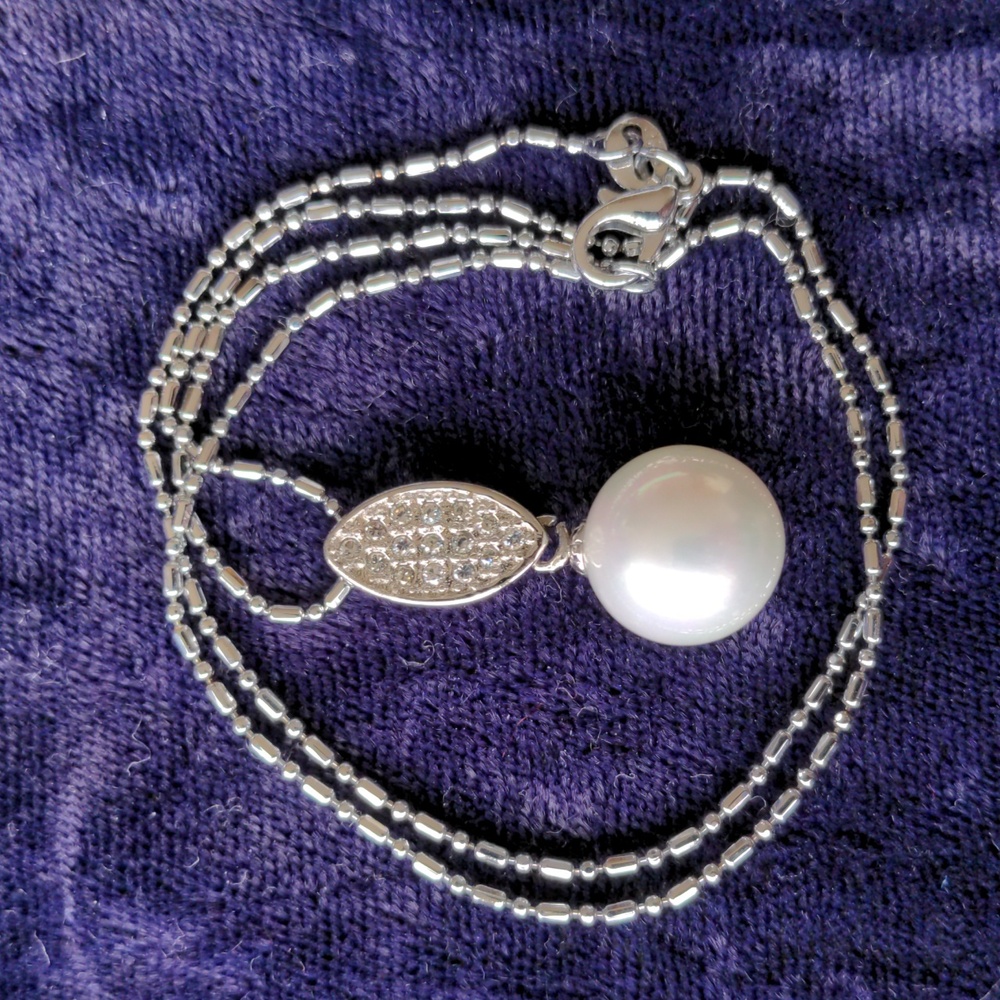 One of a kind exotic 925 silver necklace with large faux pearl pendant